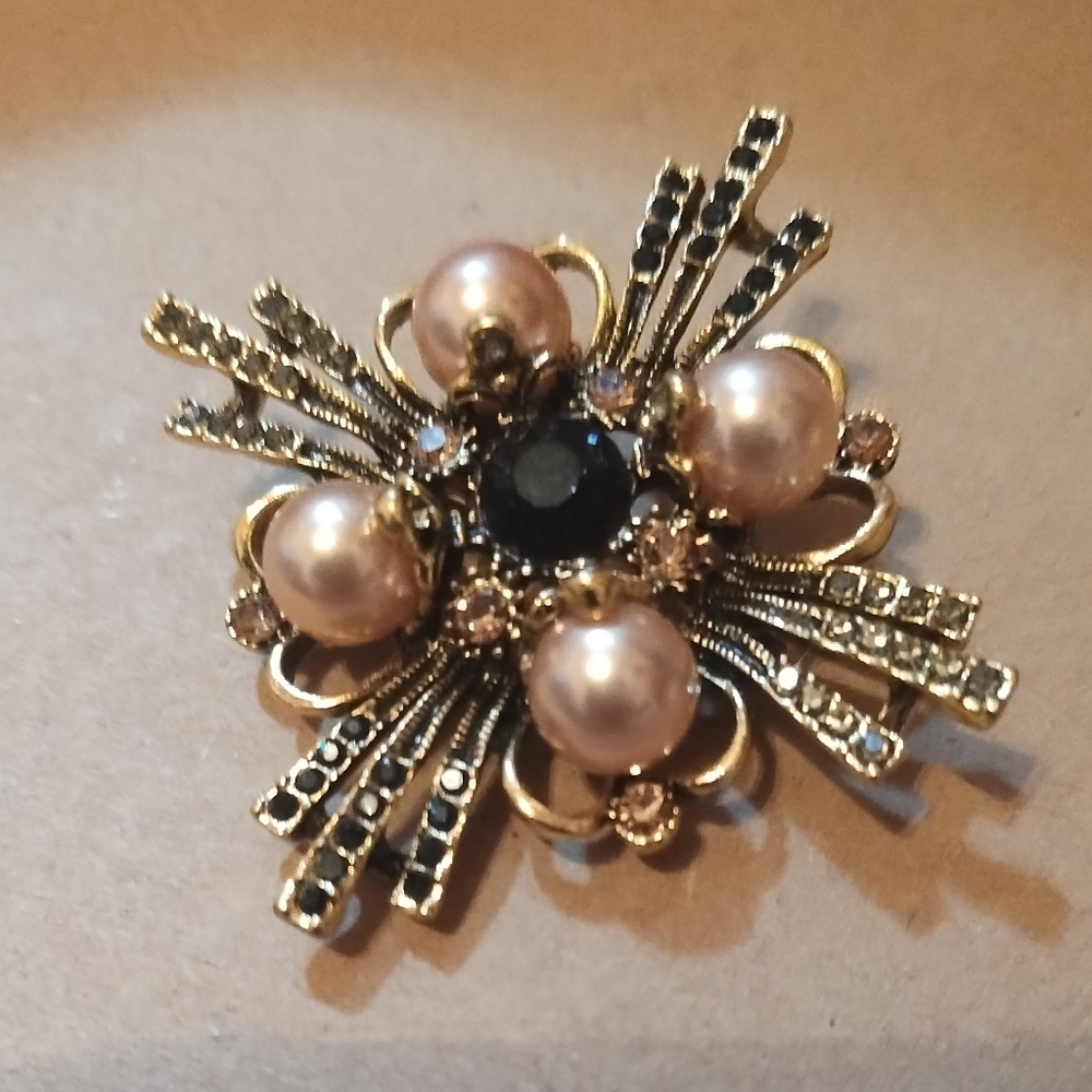 Elegant Gold and Black Pearl Brooch